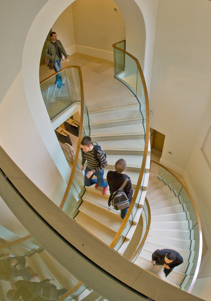 Students using staircase in ׼ϲ̳ campus building.